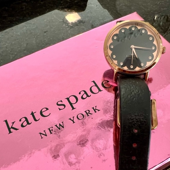 Kate Spade black & gold watch w rhinestones
scalloped Edges leather band WORKING